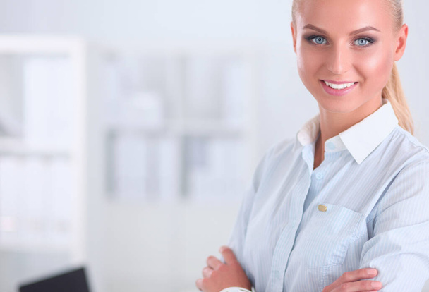 Portrait of beautiful smiling women in white style at the office. - Foto, imagen