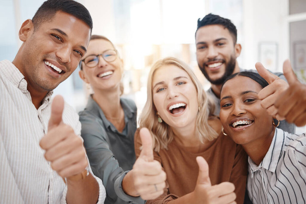 Group, business people and thumbs up in startup portrait, diversity and solidarity for smile, teamwork or goals. Men, women and agreement with hand, sign language or emoji for collaboration at office. - Photo, Image