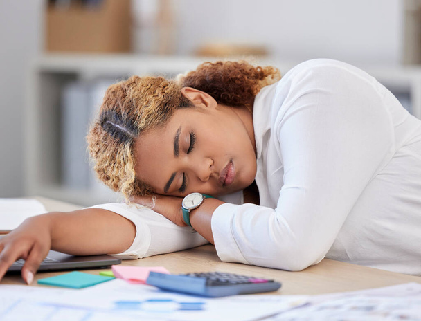 Sleeping, business and woman tired, fatigue and professional with burnout, overworked and consultant. Female person, employee and agent at her desk, exhausted and nap on a break, relax and resting. - Photo, image