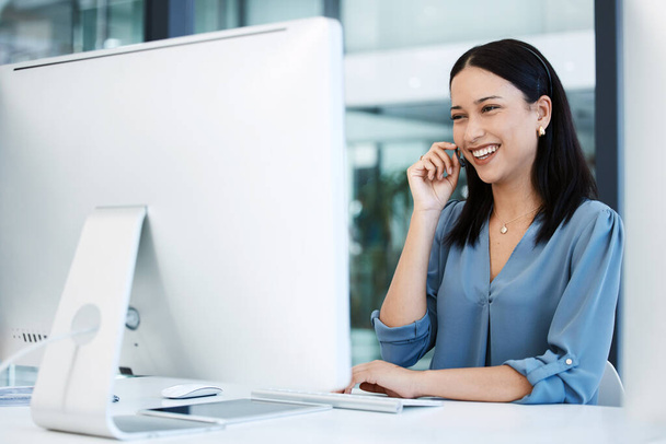 Happy woman, call center and laughing in consulting, customer service, support or funny discussion at office. Friendly female person, consultant or agent laugh with smile for fun joke in contact us. - Photo, Image