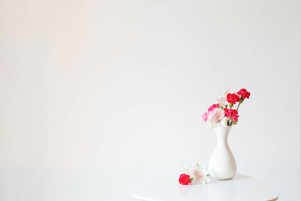 flowers in  white vase on white background - Foto, Imagem