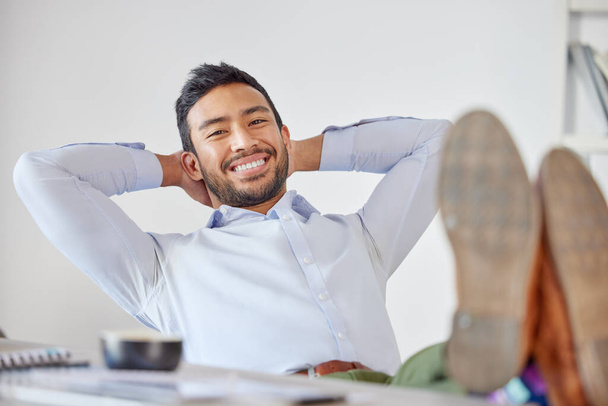 Relax, smile and portrait of business man at desk for pride, stretching and break. Happy, achievement and inspiration with male employee in office for mental health, professional and satisfaction. - Φωτογραφία, εικόνα