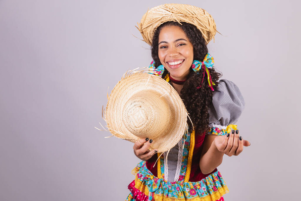 Black, Brazilian woman wearing June party clothes - Foto, immagini