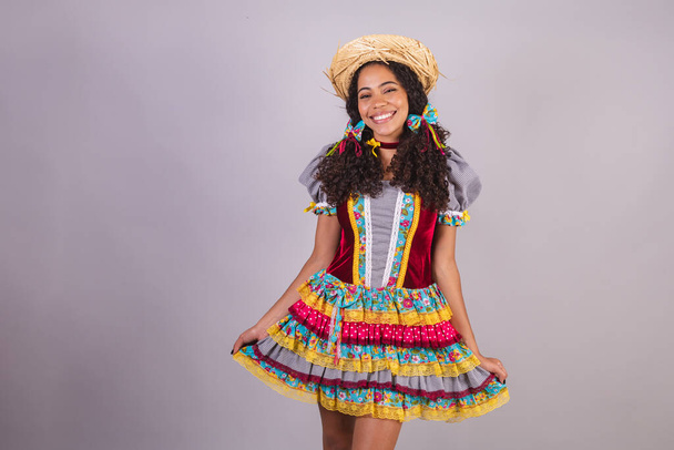 Black, Brazilian woman, wearing June party clothes, fraternization in the name of So Joo, Arraial. posing for photo - Fotografie, Obrázek