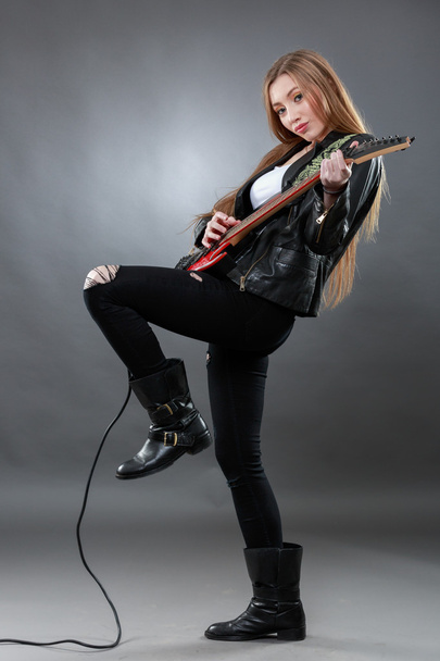 Beautiful young,blond woman with a electric guitar - Zdjęcie, obraz