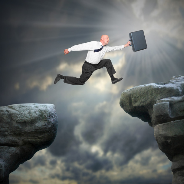 Senior businessman jumping to new job - Photo, Image