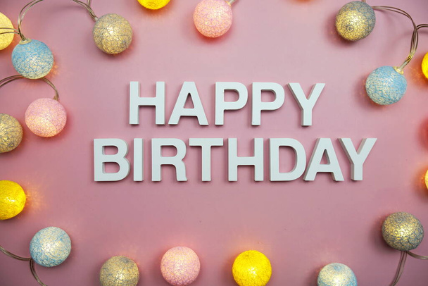 Happy Birthday alphabet letters on pink background - Фото, изображение