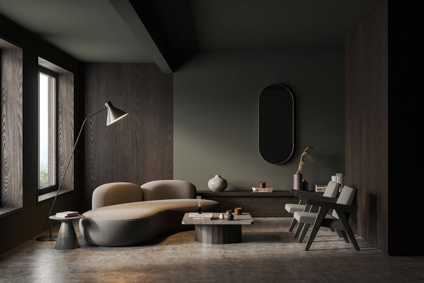 Interior of stylish living room with gray and dark wooden walls, comfortable sofa and armchairs, dark wooden dresser and vertical mirror. 3d rendering - Foto, Imagen