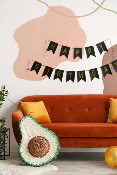 Interior of living room decorated for birthday with pinata and balloons - Zdjęcie, obraz