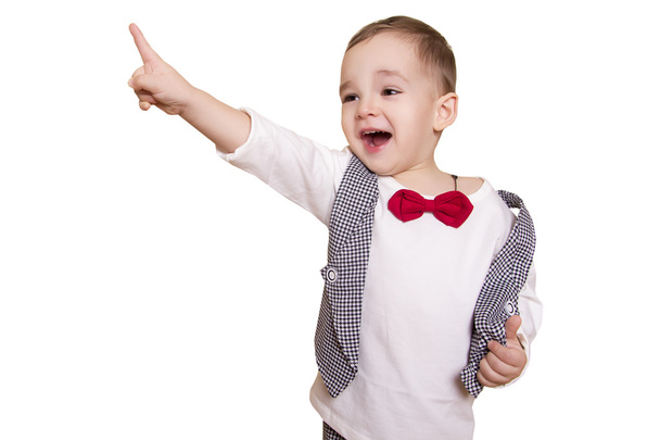 little boy in a checkered suit and bow tie shows thumb up  - Foto, immagini