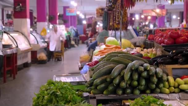 big bony market in center of Batumi, shopping market on old street. Food products of our own production are sold everywhere. cucumbers, vegetables and fruits. Food. - Footage, Video
