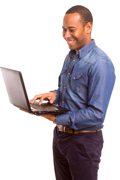 Homme d'affaires africain avec ordinateur portable
 - Photo, image