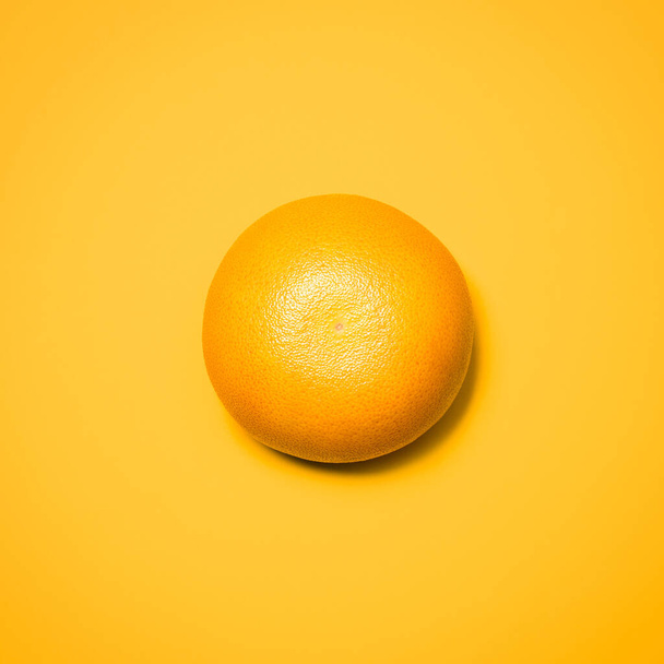 Studio, orange and fruit for diet, vitamin C and healthy nutrition on isolated wallpaper or background. Food, eating organic and grocery for natural wellness, health and fruity citrus mockup. - Fotografie, Obrázek
