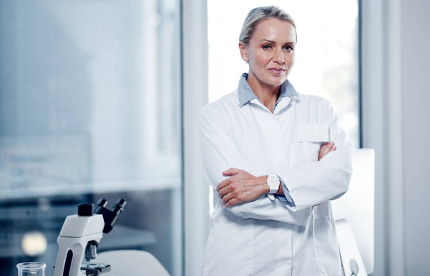 Making history with her contribution to science. Portrait of a mature scientist standing in a lab - Photo, Image