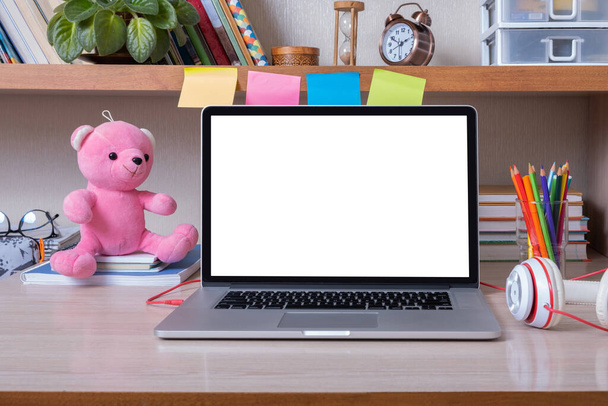 Laptop on desktop with blank screen in children's room. Kid education mockup, template. - Photo, image