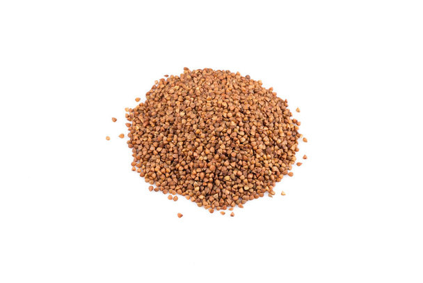 Pile of buckwheat seeds isolated over the white background - Foto, Imagen