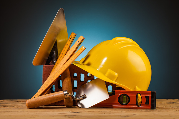 Yellow helmet and builder tools - Φωτογραφία, εικόνα