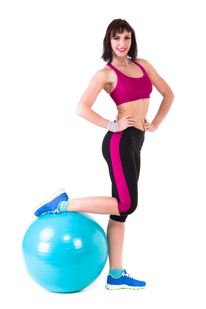 Young smiling woman makes exercise with fitball - Φωτογραφία, εικόνα