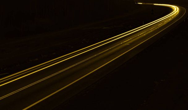 yellow car lights at night. long exposure - Photo, Image