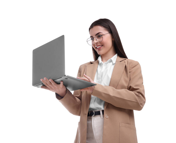 Beautiful businesswoman using laptop on white background, low angle view - Photo, Image