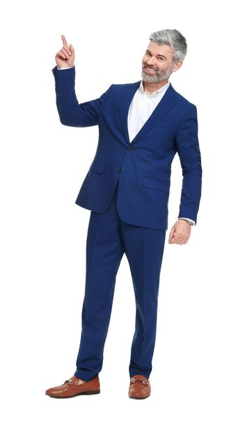 Mature businessman in stylish clothes posing on white background - Photo, Image