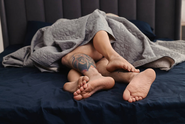 Passionate couple having sex on bed at home - Φωτογραφία, εικόνα
