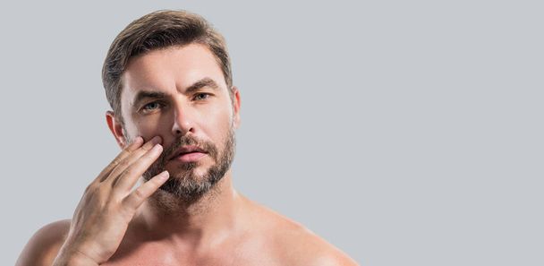 Close up portrait of handsome man. Portrait of shirtless man for skincare and beauty concepts. Man with beauty face, facial skin portrait. Male healthy skin and spa concept. Banner for header - Fotografie, Obrázek
