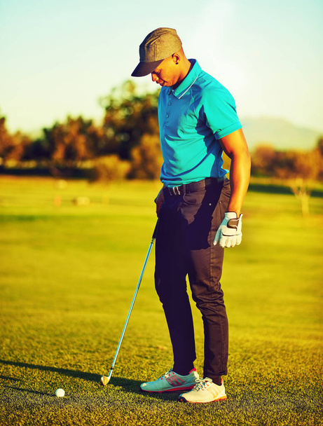 Time to show the ball whos boss. a young man playing golf - Photo, Image