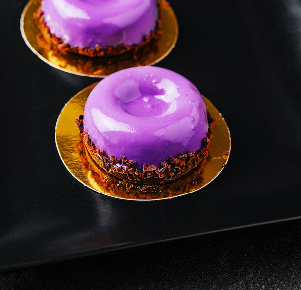 Mousse cakes from wild berries on plate - Foto, immagini