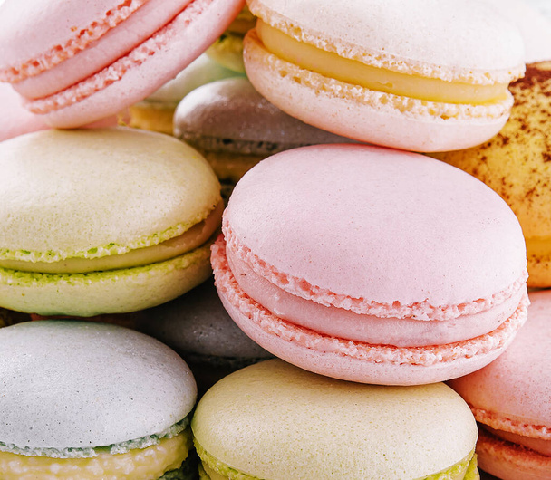 Multicolored macaroons close up background or macro - Photo, image