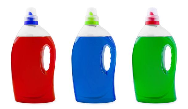 Vihreä, punainen ja sininen nestemäinen saippua tai pesuaine muovipullossa - Valokuva, kuva