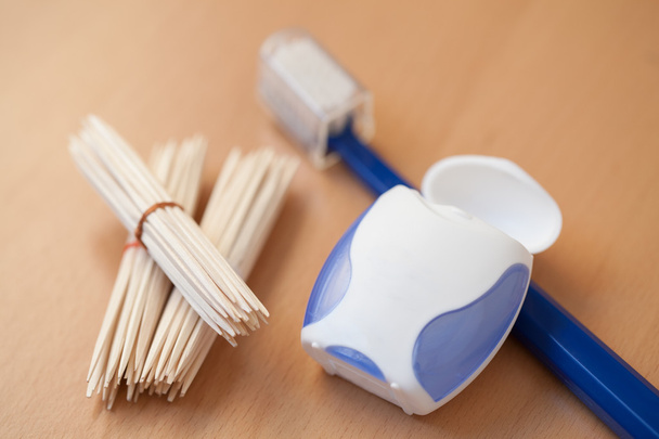 toothpicks, dental floss and toothbrush - Photo, Image