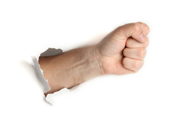 Fist punches a white background. Gesture of battle and aggression. - Fotoğraf, Görsel
