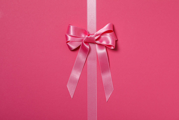 Concept of different ribbons, pink ribbon on pink background - Zdjęcie, obraz