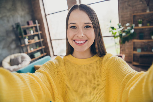 Photo of gorgeous peaceful satisfied young person beaming smile make selfie recording video modern apartment inside. - Photo, Image