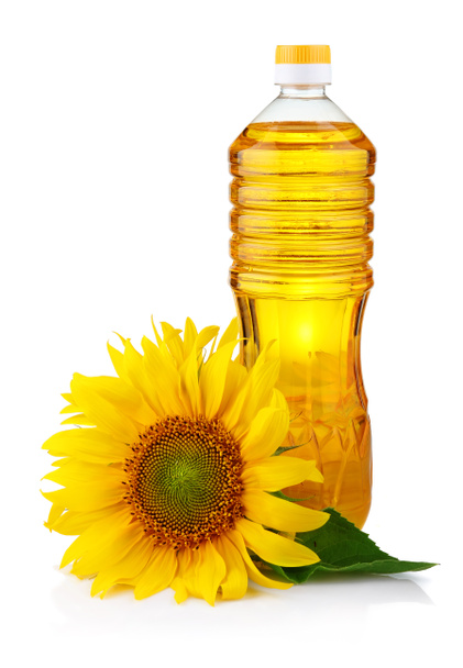 Пляшка соняшникової олії з квіткою ізольована на білому
 - Фото, зображення