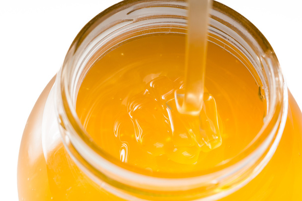 an image of jar of honey isolated on white background - Φωτογραφία, εικόνα