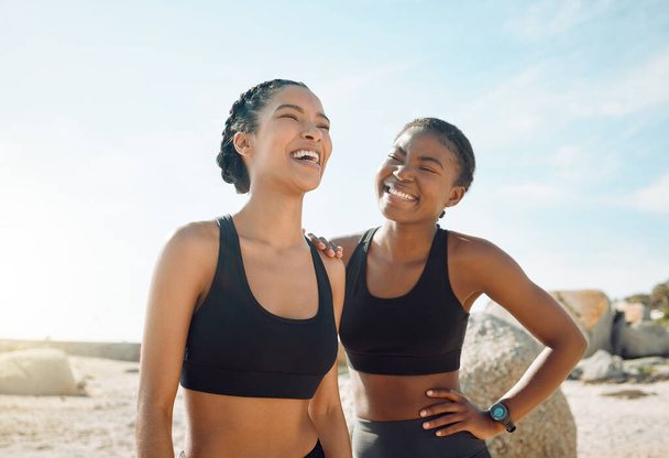 Fitness friends laughing at beach, women workout together with happiness and active lifestyle outdoor. Exercise in nature, healthy and happy with female people have funny conversation while training. - Fotó, kép