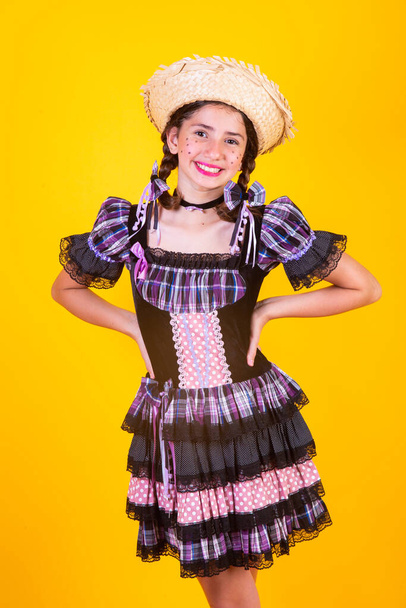 Brazilian girl, with clothes from Festa Junina, Arraial, Festa de So Joao. Vertical portrait. - Fotoğraf, Görsel