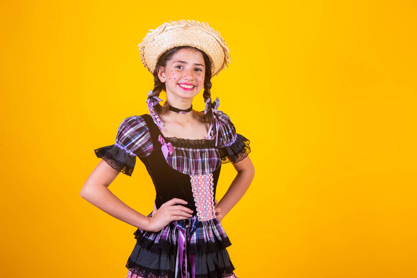 Brazilian girl, with clothes from Festa Junina, Arraial, Festa de So Joao. Horizontal portrait. - Фото, изображение