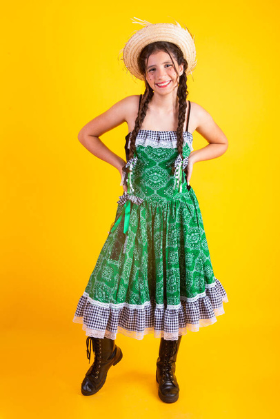 Brazilian girl, with clothes from Festa Junina, Arraial, Festa de So Joao. Vertical portrait. - Photo, Image