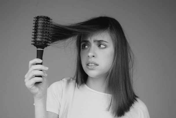 Sad woman with hair loss problem worried about hair loss - Fotoğraf, Görsel