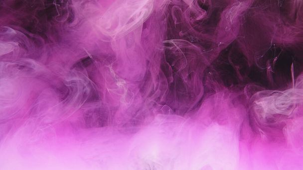 Paint water splash. Color smoke cloud. Aura mist. Pink purple fume explosion wave texture on dark black abstract art background. - Photo, image