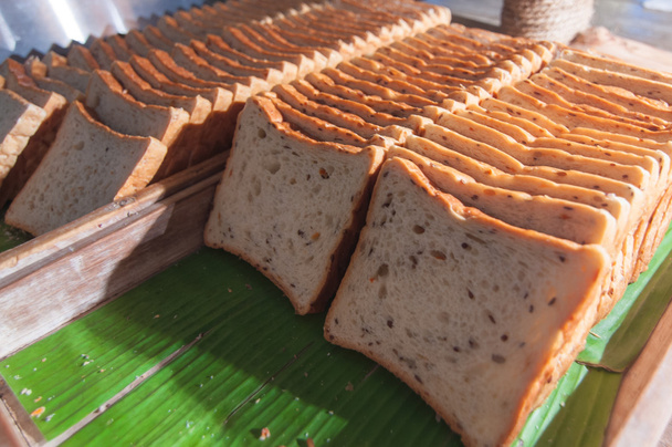 Brood: Bruin (worden deels verbruikt) - Foto, afbeelding