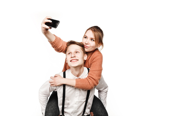Teenagers couple making selfie by smartphone - Photo, image