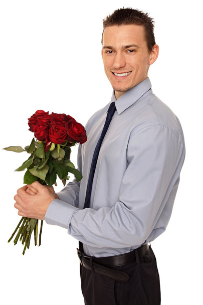 Man holds bouquet of red roses - Photo, image