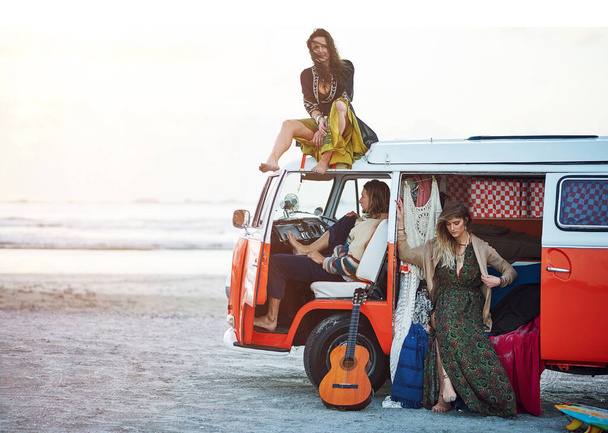 Enjoy the journey. a group of young friends stopping at the beach during a roadtrip - Foto, Imagem