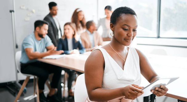 Black woman in business, smile with tablet in conference room, leadership and meeting with corporate group. Team leader, wireless tech and female person with presentation and professional mindset. - Photo, Image