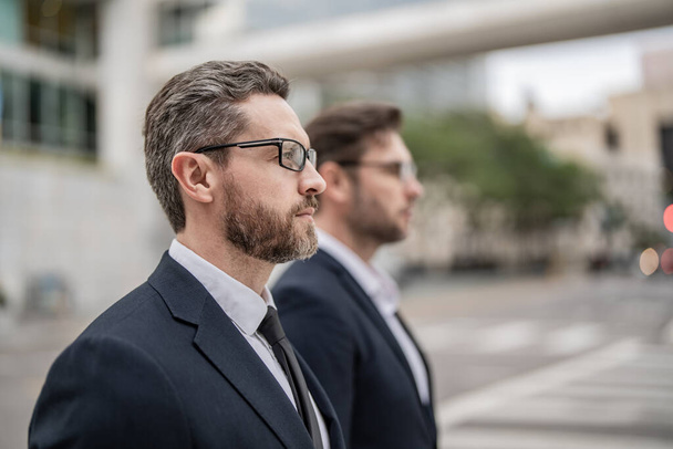 selective focus of successful business leader boss men. successful business leader boss in suit. successful business leader boss outdoor. photo of two successful business leader boss. - 写真・画像