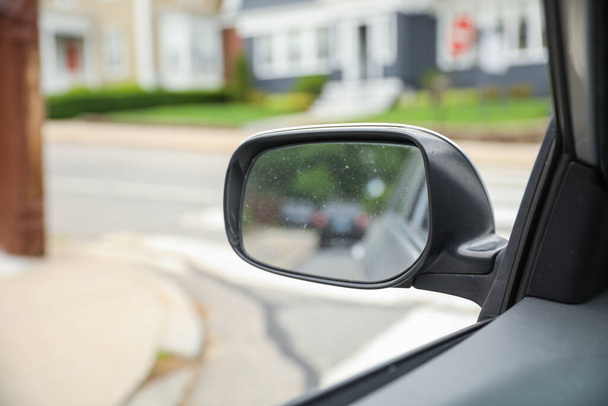 Car side mirror: a symbol of awareness, visibility, reflection, and the importance of being mindful of one's surroundings while driving. - Fotografie, Obrázek